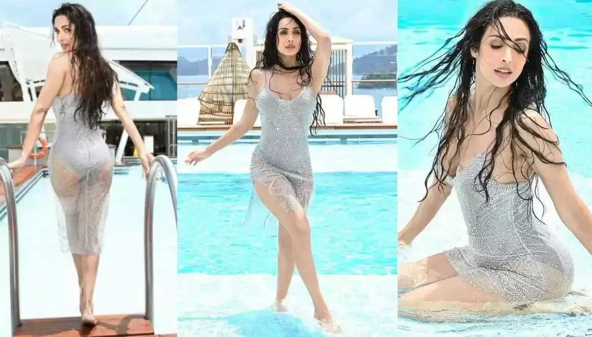 Malaika Arora: সাহসী ফটোশুটে জলকেলিতে মত্ত মালাইকা, ভক্তরা দেখে পাগল Malaika Arora: সাহসী ফটোশুটে জলকেলিতে মত্ত মালাইকা, ভক্তরা দেখে পাগল